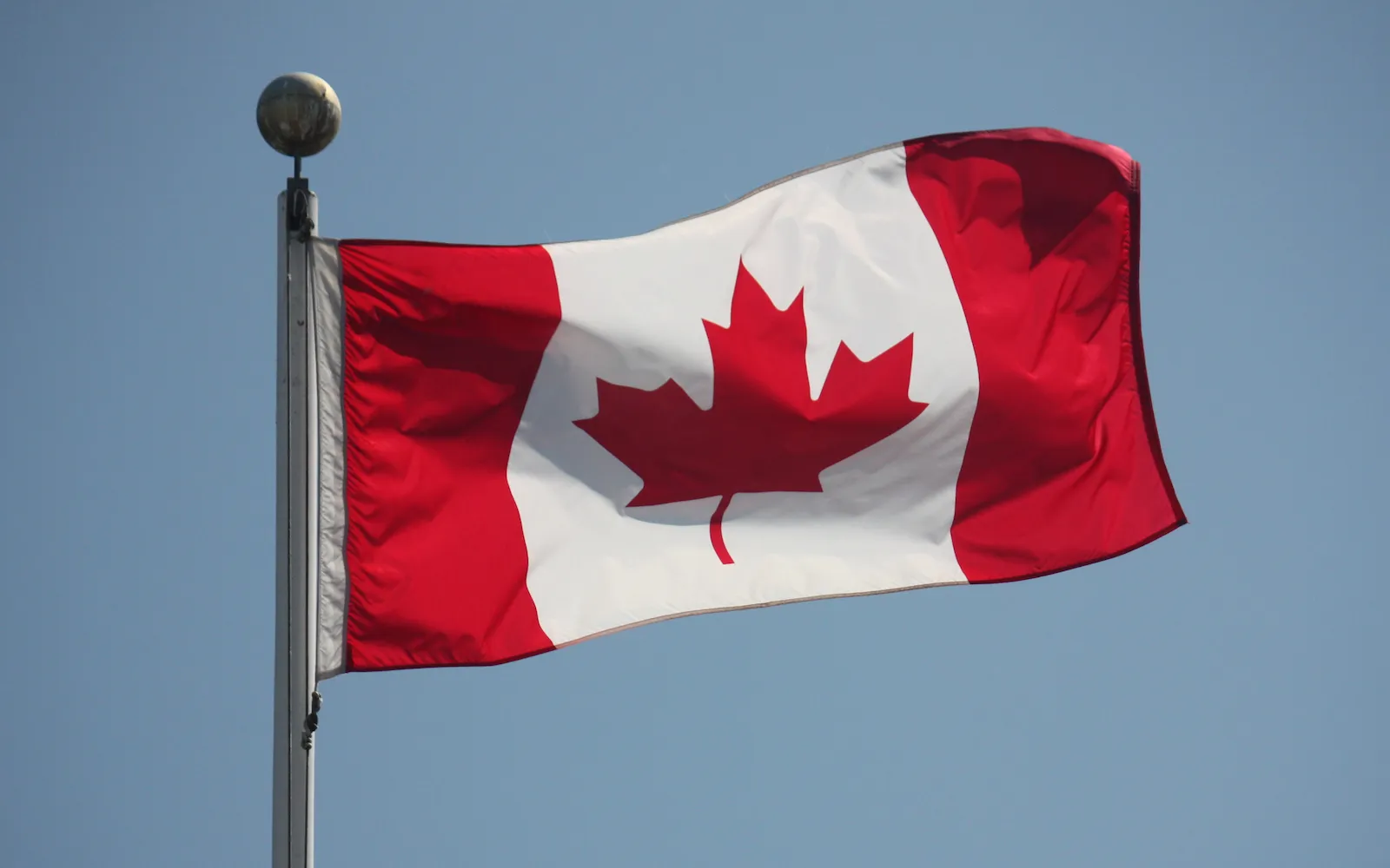 The Canadian flag flies above Vanier Park in Vancouver.